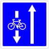 panneau de signalisation bleu, sens pour les cyclistes et pour les voitures